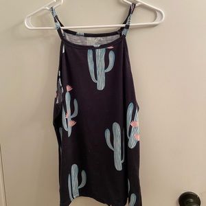 Coral and black cactus tanks.